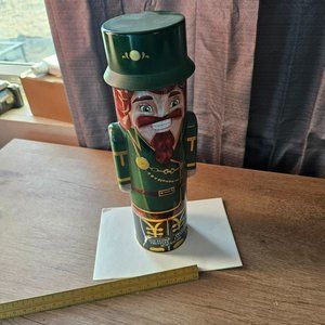 vintage green suited man storage can